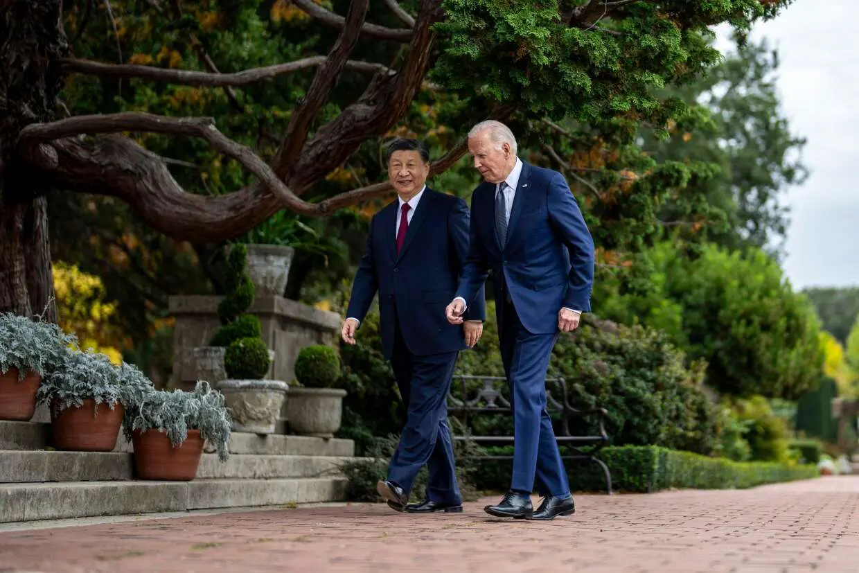 الإيغور الأمريكيون يوجسون خيفة من مصير أقاربهم المحتجزين بعد قمة بايدن وشي 7 231117 joe biden xi jinping ew 218p e66b32