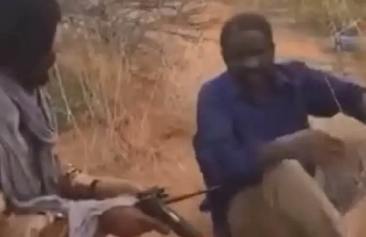 RSF commander interrogates a civilian in El Fasher before killing him on August 2025 750x485 1