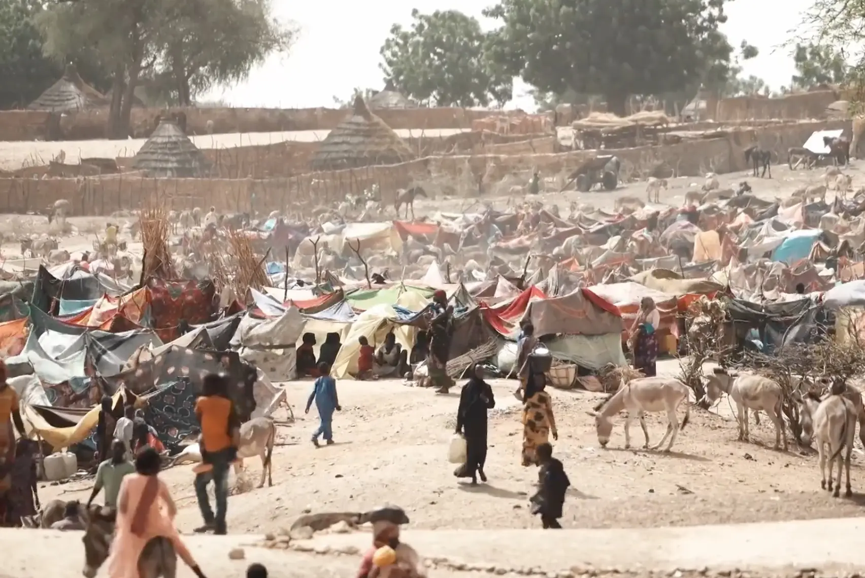 Screengrab of refugee camp from Number of Refugees Who Fled Sudan for Chad Double in Week
